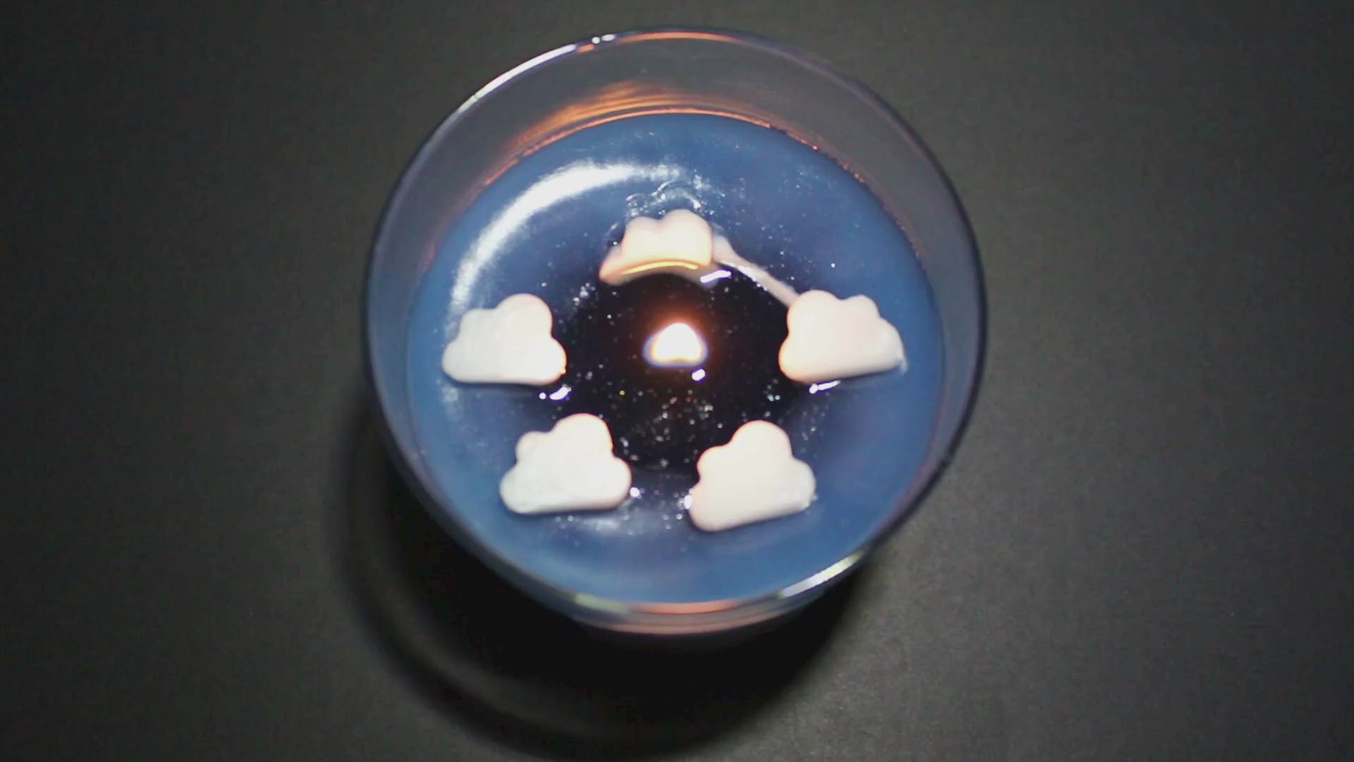 the breezy bunny candle shows sparkle and glitter as it melts in the video