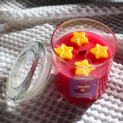 our cosmic candy pink candle has yellow stars and the glass lid is off to the side