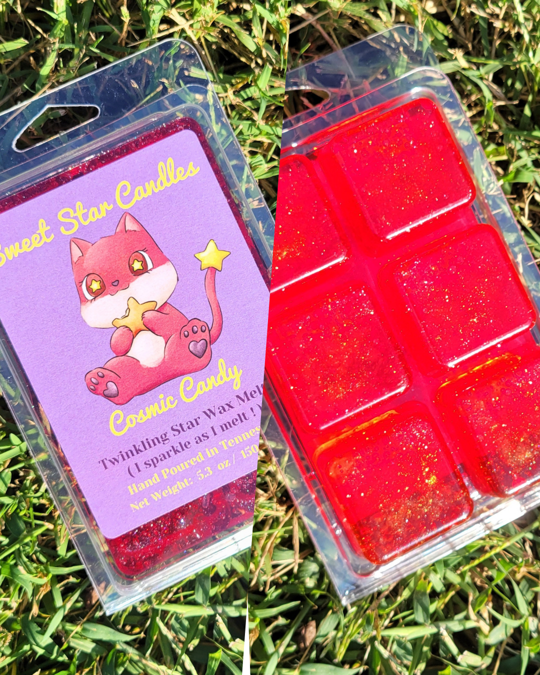 Two packages of Cosmic Candy Twinkling Star Wax melts by Comet Star Candles, placed on green grass. One package shows the purple label with a pink cartoon cat, and the other shows the red glittery wax melts in a clear plastic clamshell.